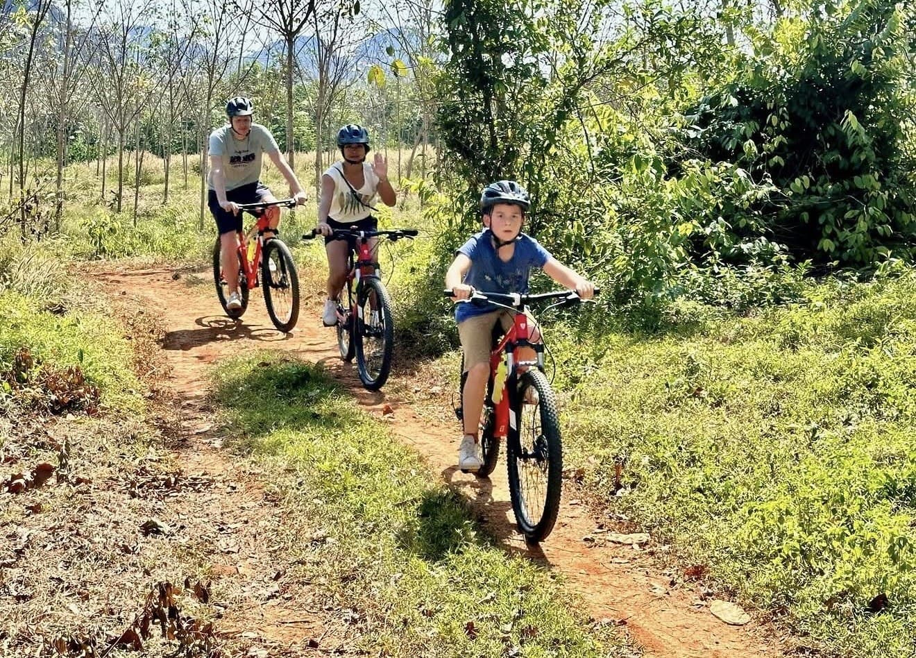 A family riding the plantation trails