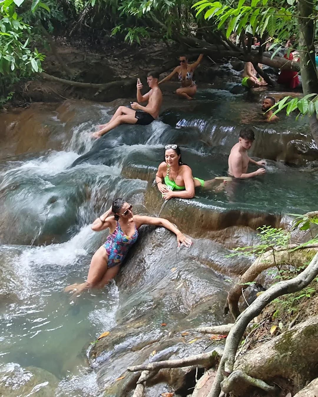 Soaking in the hot-spring waterfall pools at Khlong Thom