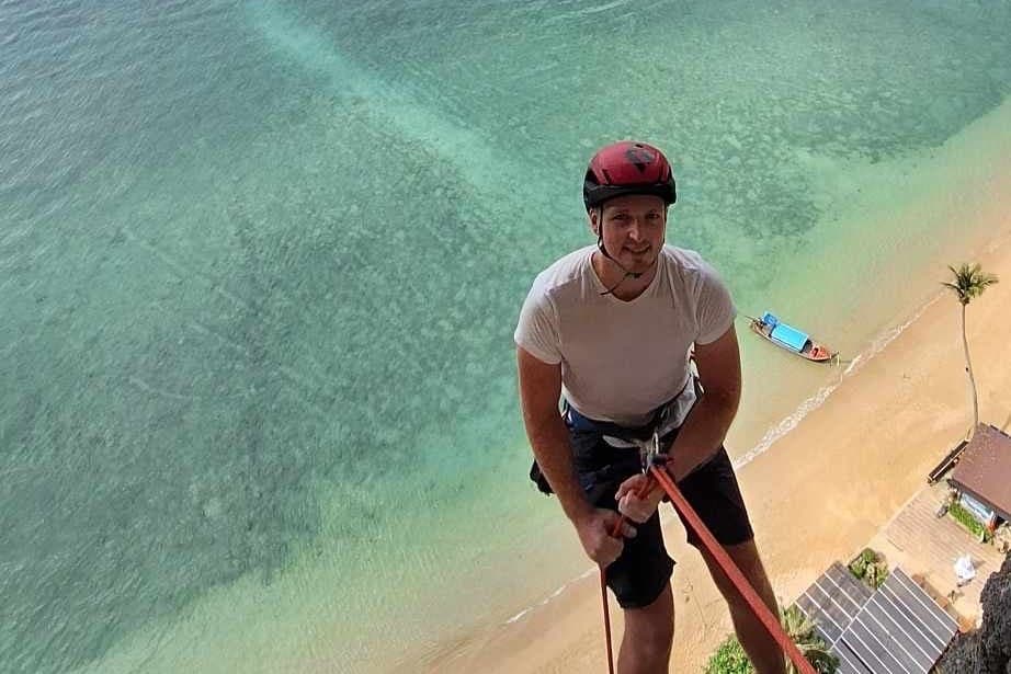 Abseiling high above Tonsai bay