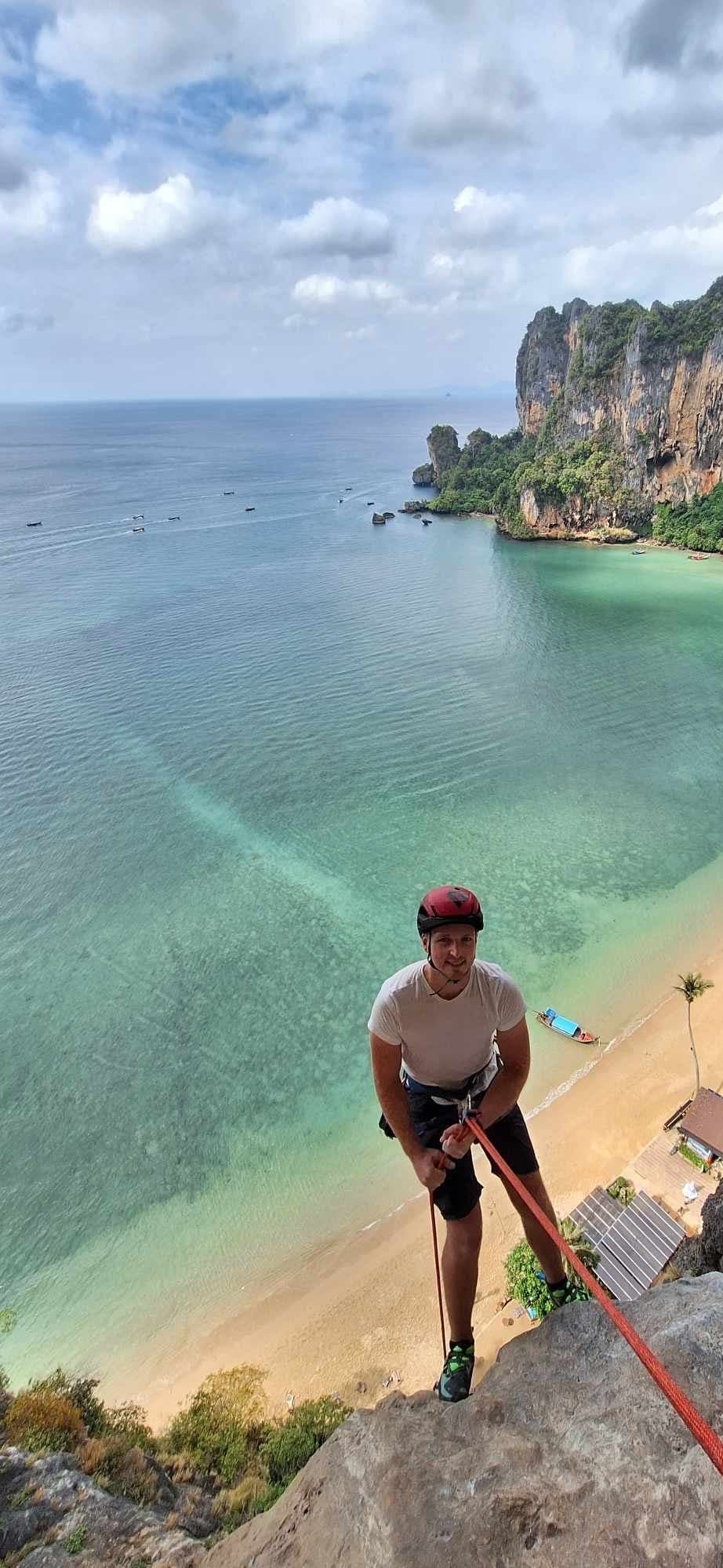 Abseiling high above Tonsai bay